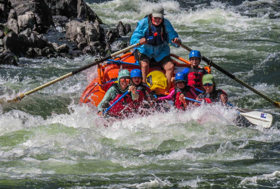 Group rafting through Russian rapid on the Rogue River