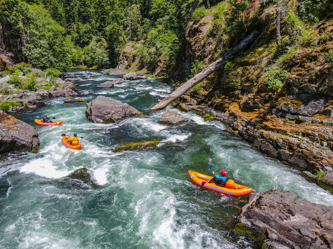 Kayakers in Pinball rapid on the North Umpqua River