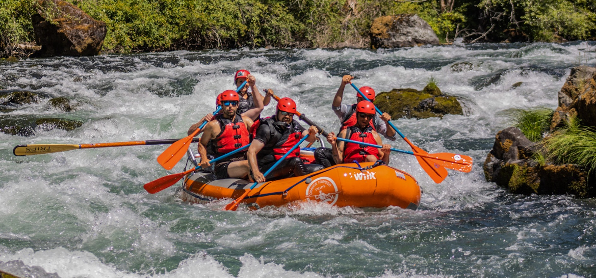 Couple whitewater rafting on the North Umpqua River