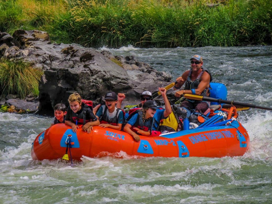 Kids in a raft loving the Wild and Scenic Rogue River