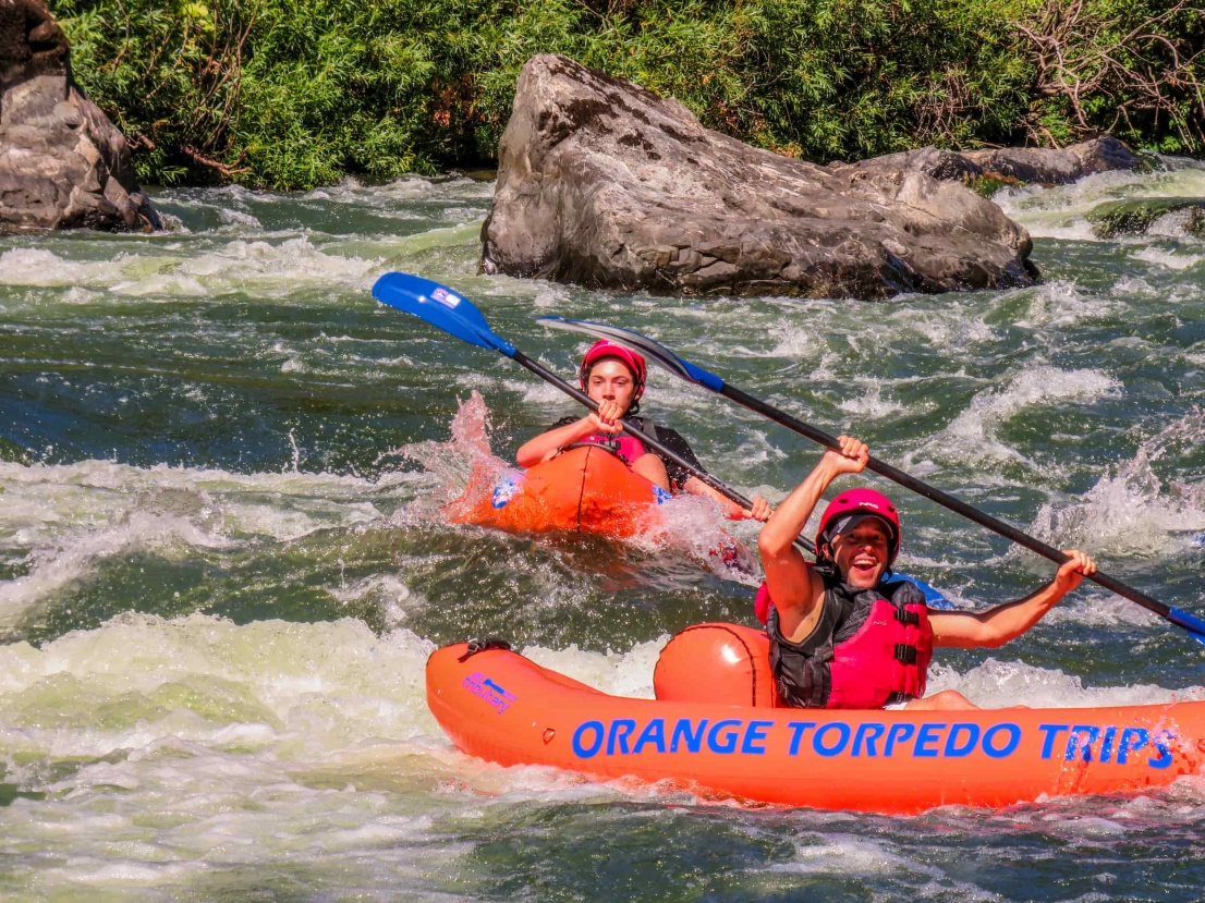 Two kayakers on the Rogue River at China Rapid