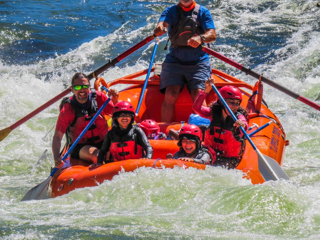 Kids laughing in raft on the Rogue River