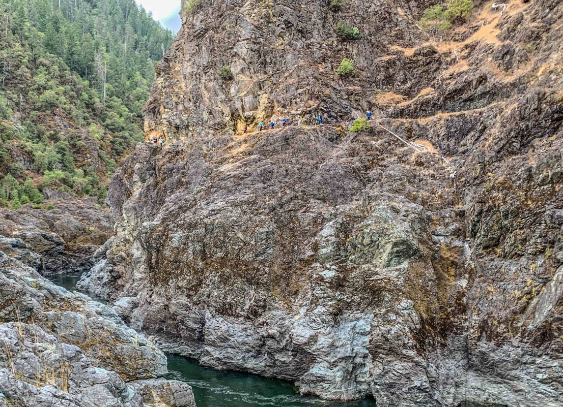 Hikers on the Rogue River Trail above mule creek canyon