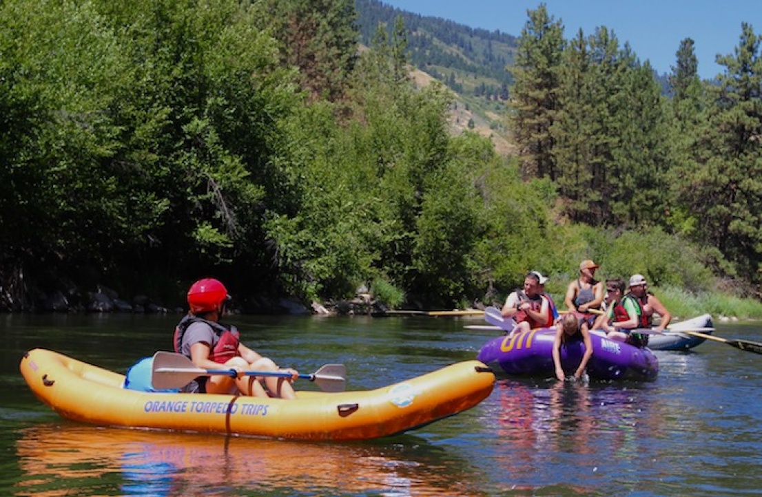 family rafting together in Idaho