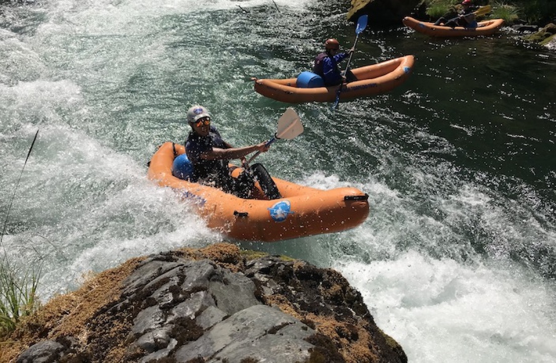 Kayaker in rapids on the North Umpqua River