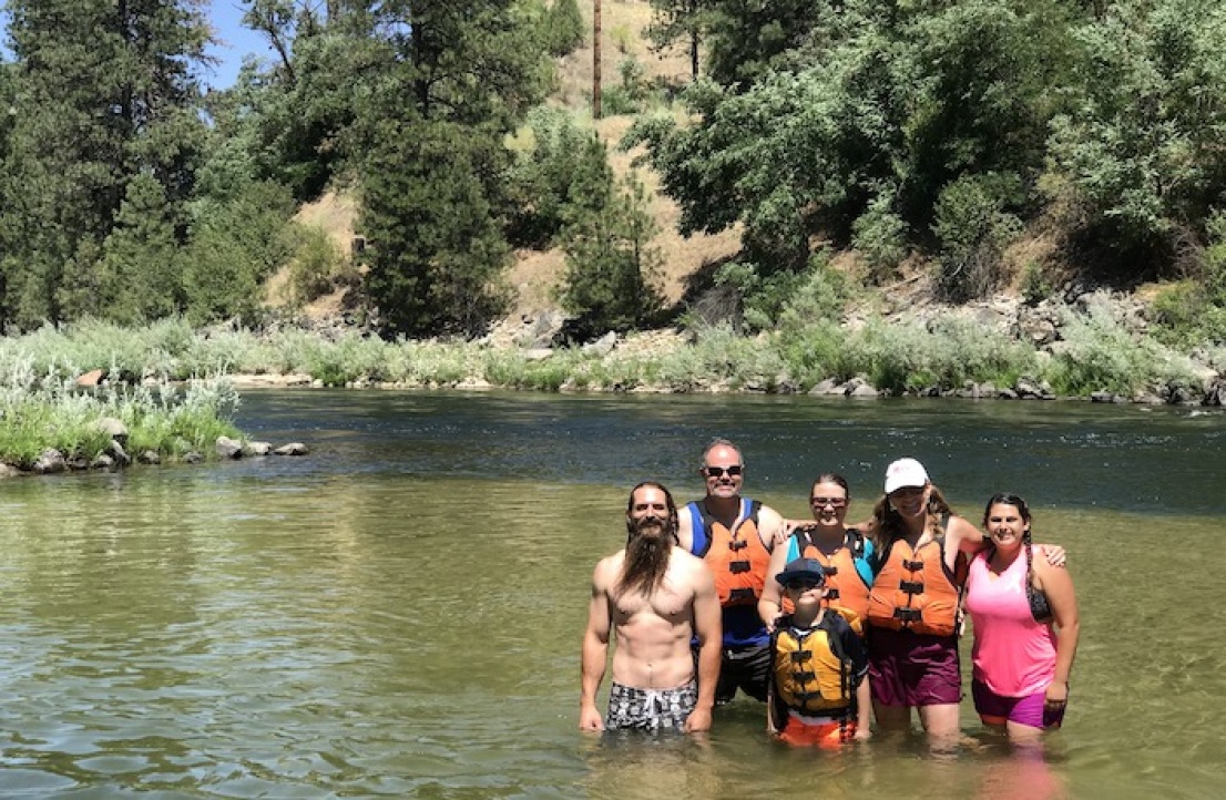 Family on the river together in Idaho.
