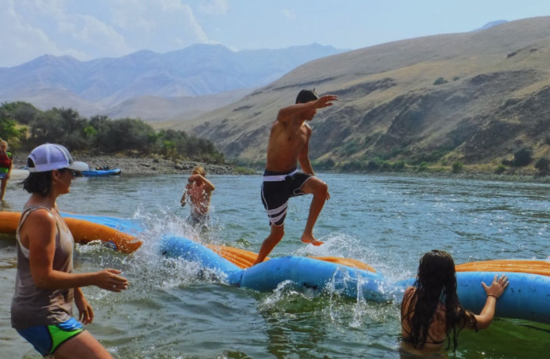 Family playing on the Salmon River