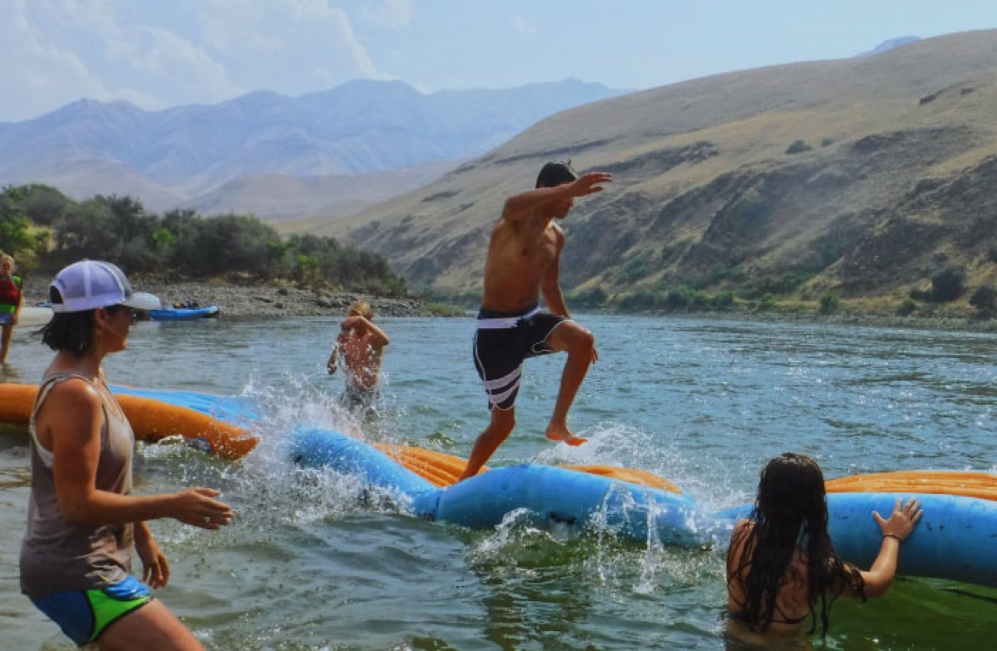 Family playing on the Salmon River