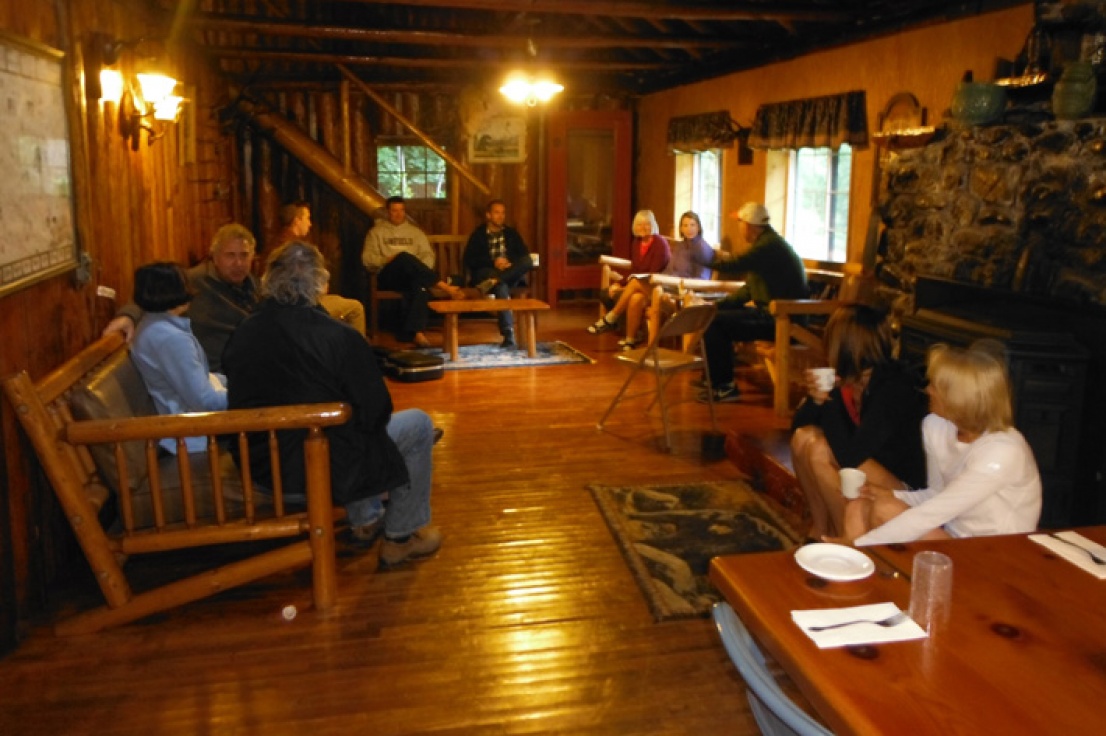 Guests relaxing inside at Blackbar lodge