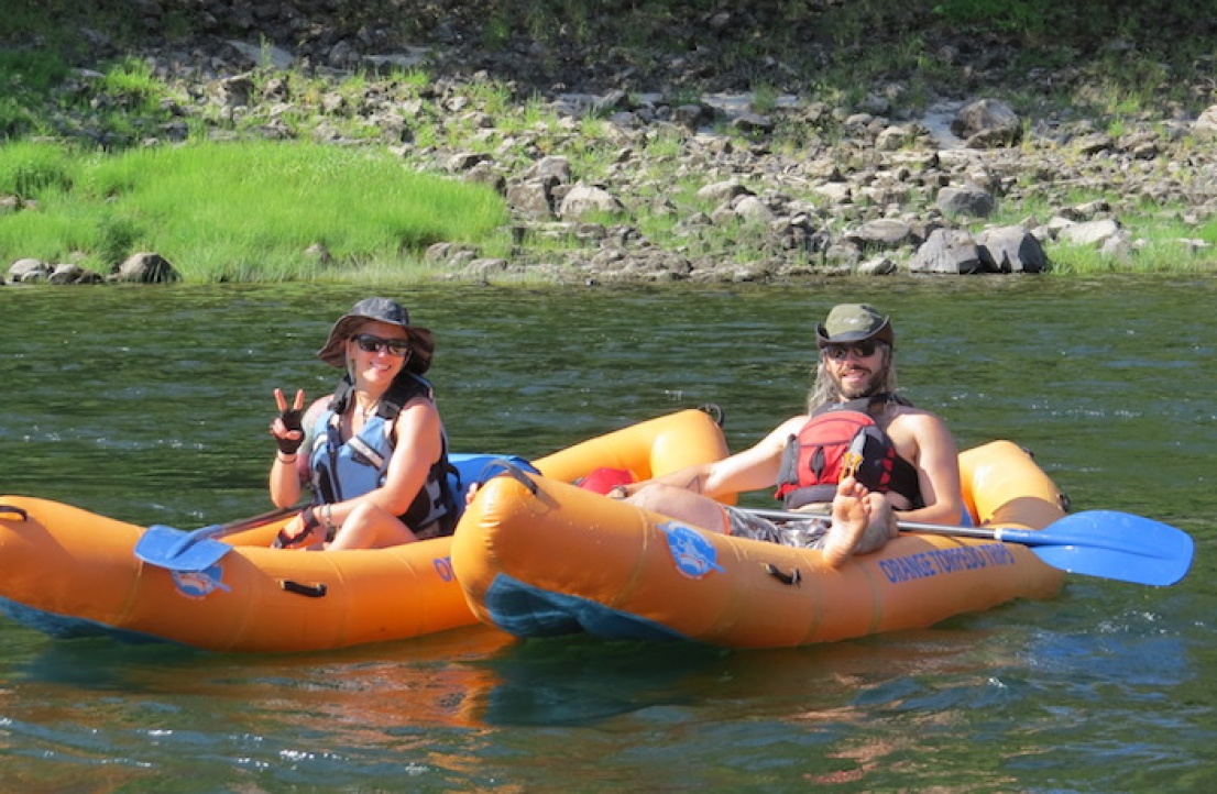 Couple enjoying the Salmon River on their McCall vacation.