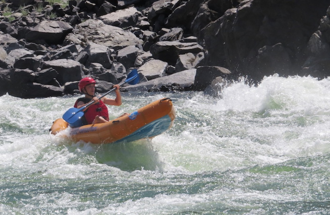 Kid has fun learning to inflatable kayak on the Salmon River