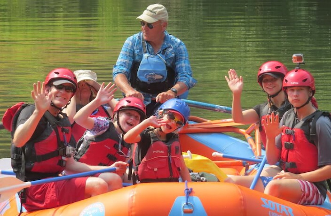Family enjoying a rafting trip on the Rogue River with Orange Torepdo Trips