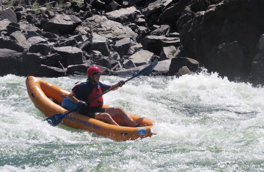 Inflatable Kayaker on rapids near McCall Idaho