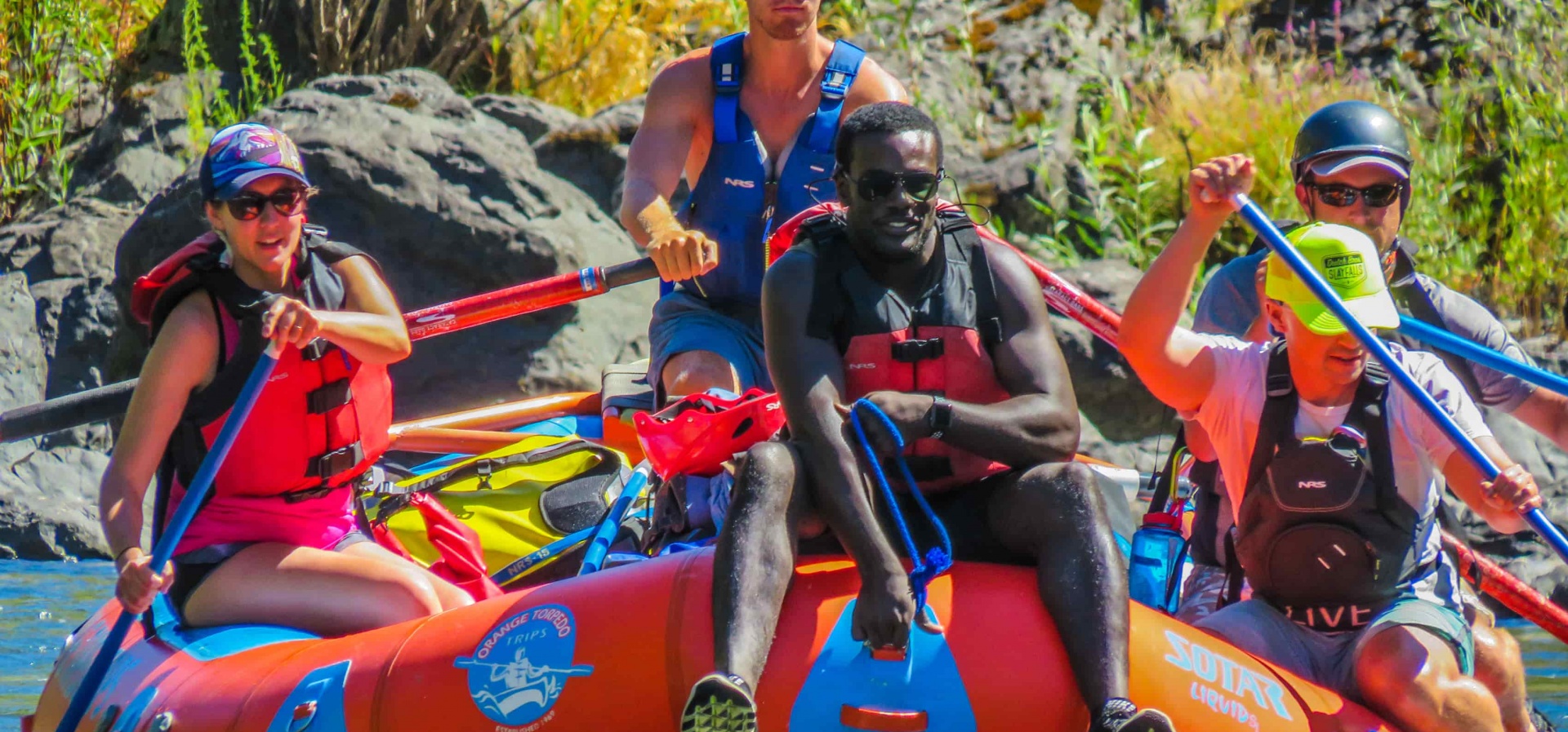 Group rafting whitewater on the Rogue River