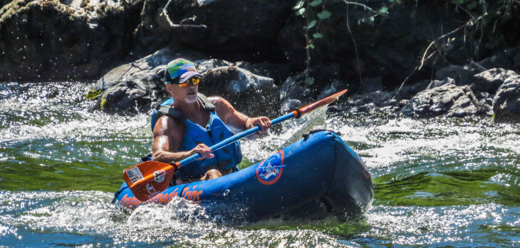 Tim Satre kayaking the Rogue River