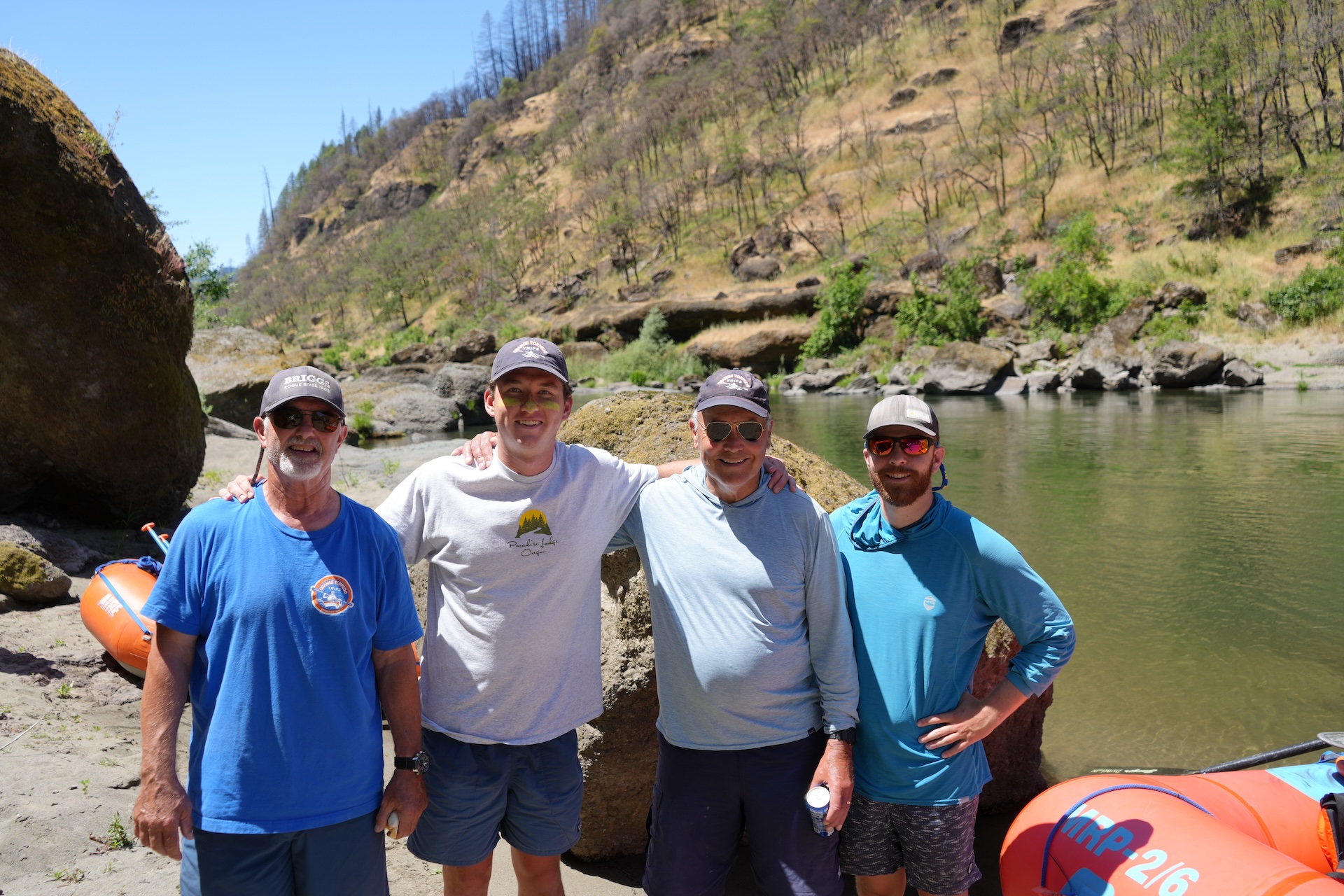 Orange Torpedo Rogue River Guides in Oregon on a sunny day.